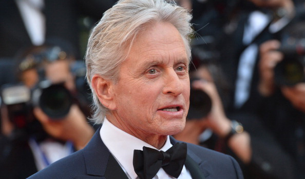 US actor Michael Douglas arrives on May 21, 2013 for the screening of the film "Behind the Candelabra" presented in Competition at the 66th edition of the Cannes Film Festival in Cannes. Cannes, one of the world's top film festivals, opened on May 15 and will climax on May 26 with awards selected by a jury headed this year by Hollywood legend Steven Spielberg. AFP PHOTO / ALBERTO PIZZOLI (Photo credit should read ALBERTO PIZZOLI/AFP/Getty Images)